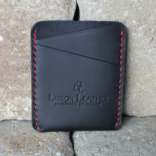 minimalist black chrome tan leather wallet with red stitching