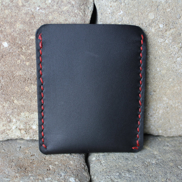 minimalist black chrome tan leather wallet with red stitching